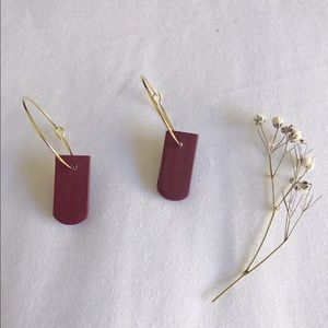 gold hoop earrings with burgundy piece